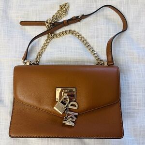 DKNY women leather tan crossbody bag purse with gold logo charm hardware